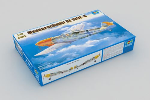 Model airplane kit box for Messerschmitt Bf 109E-4 on a gray background