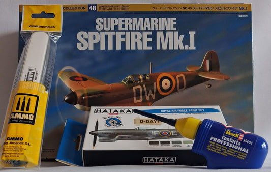Model airplane kit packaging with Ammco and Hataka products on a gray background
