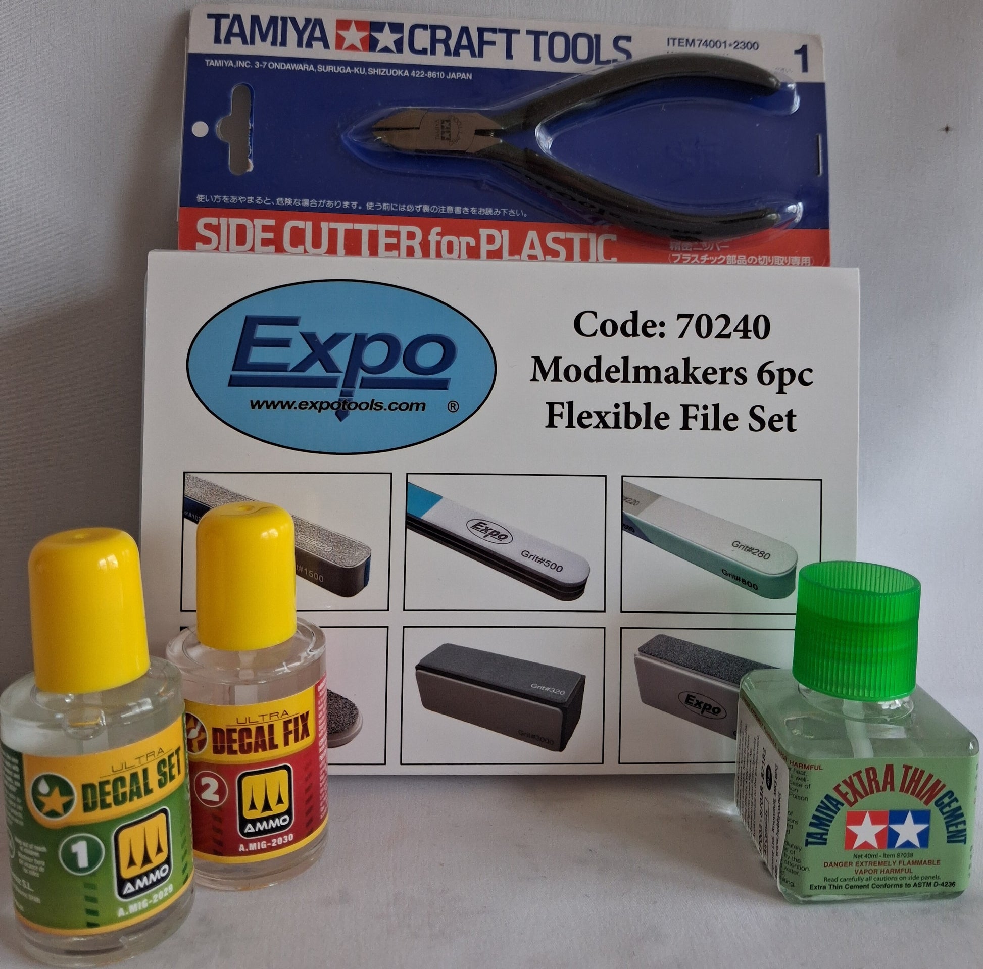 Model-making tools including a side cutter, flexible file set, and decal products with Tamiya and Expo branding.