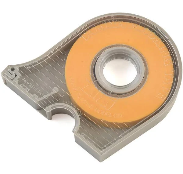 A dispenser of Tamiya masking tape, 10mm wide, with orange tape visible.