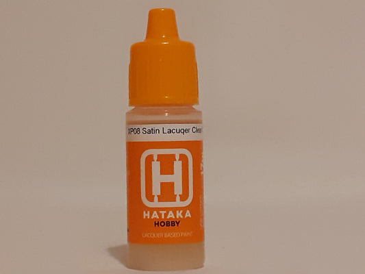 A 17ml bottle of Hataka Satin Lacquer Clear Coat with an orange cap and label, designed for use with airbrush painting techniques.